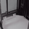 Rear stabilizing brackets used for shipment can be reattached at the bottom of the enclosure frame on the inside or outside of the rack.